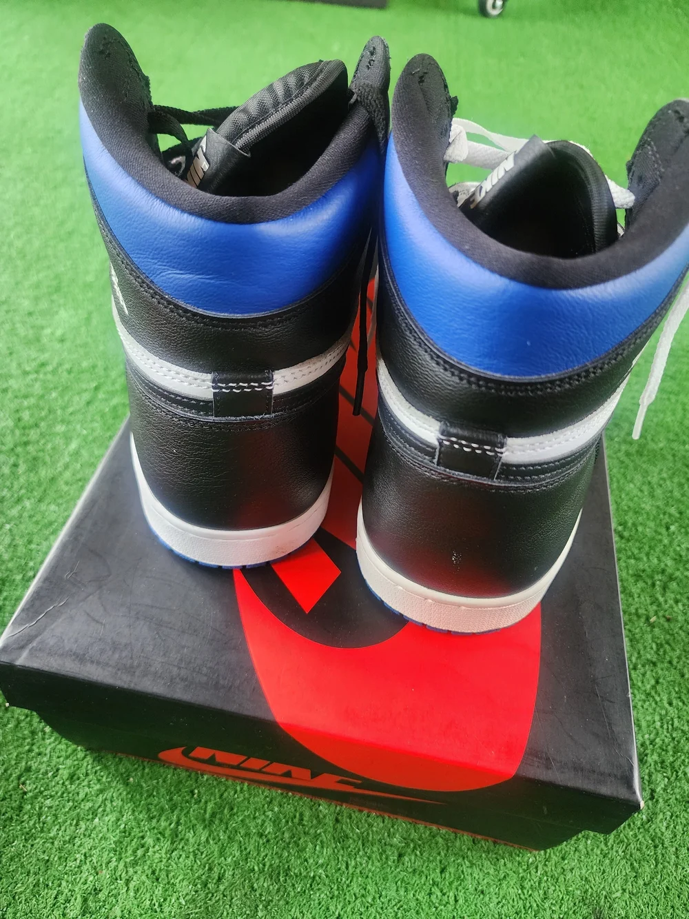 Jordan High-Top Sneakers in Black, Blue & White
